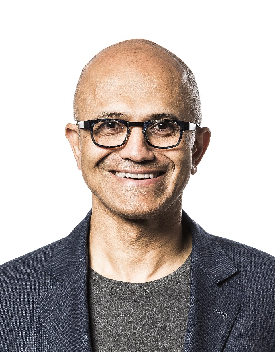 Satya Nadella's leadership at Microsoft exemplifies adaptive leadership through digital transformation focusing on cloud and AI